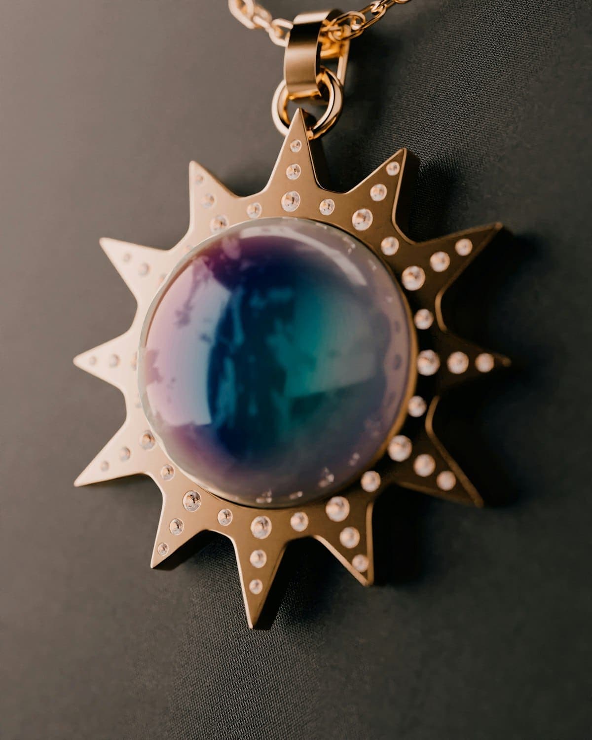 Surya Sun Medallion in gold tone